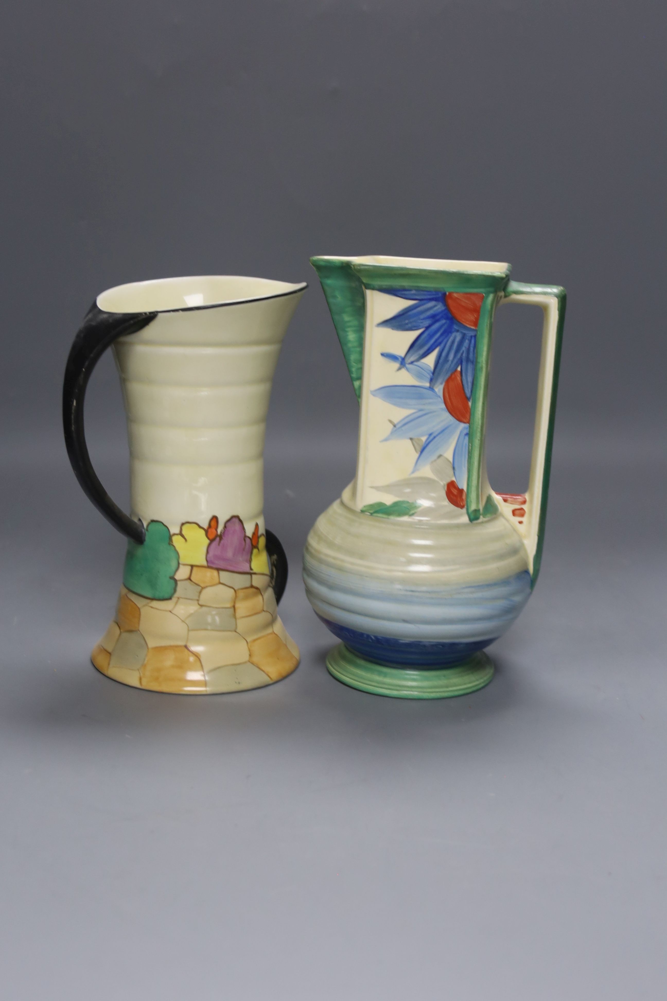 An Art Deco style jug and vase, wall mask and Crown Devon dish